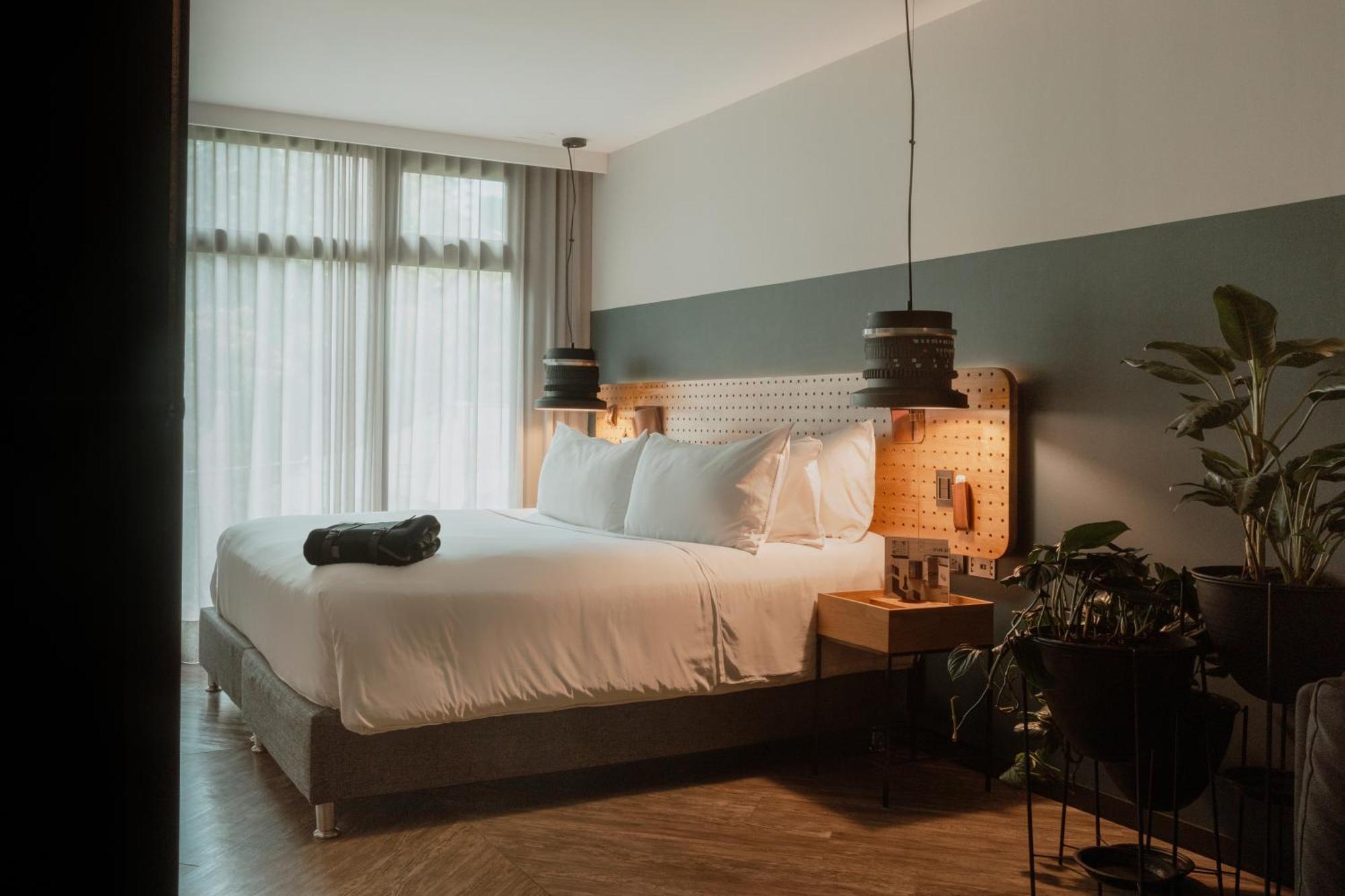 The Click Clack Hotel Medellín Zewnętrze zdjęcie A bedroom at the hotel